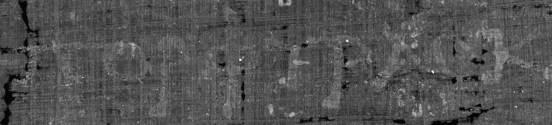 X-ray surface render of carbonized papyrus with faint ink traces