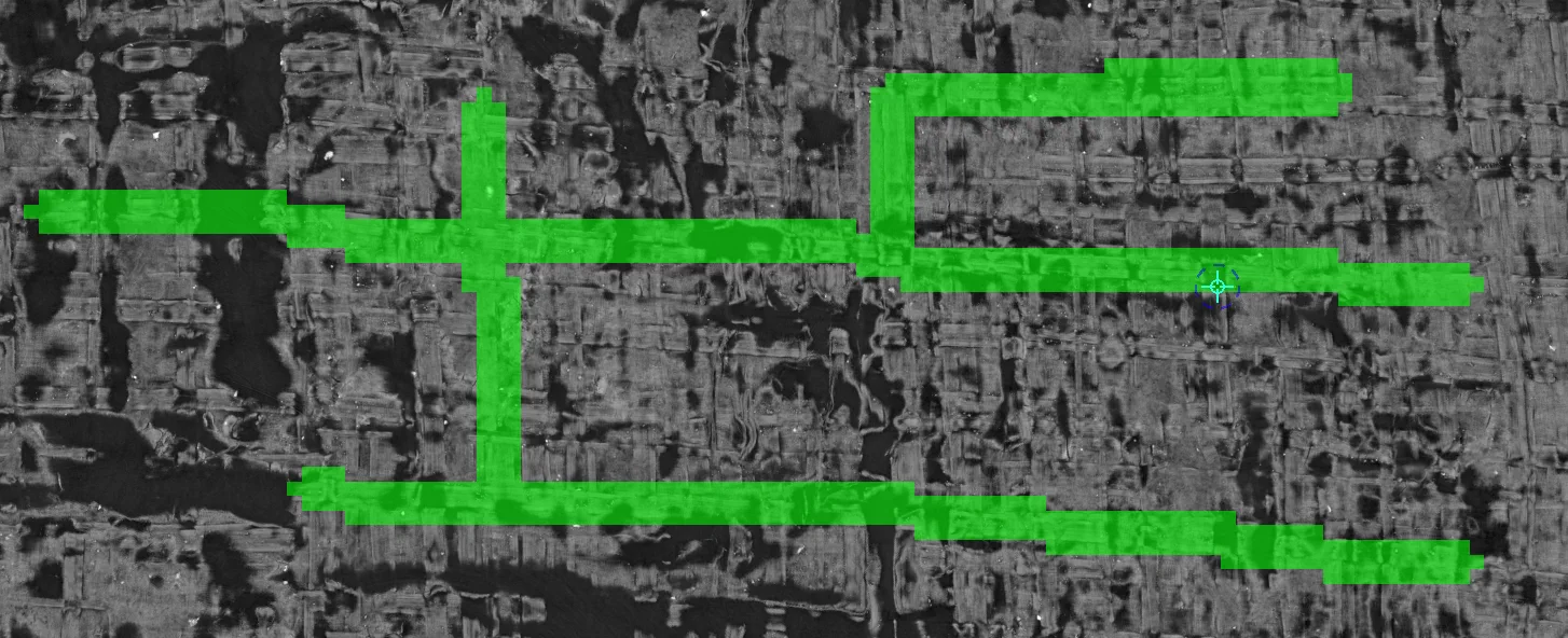 Hand-drawn green paths connecting regions across a flattened papyrus surface